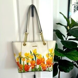 Beautiful Calvin Klein vintage bag.  Multi Color for summer and/any use.